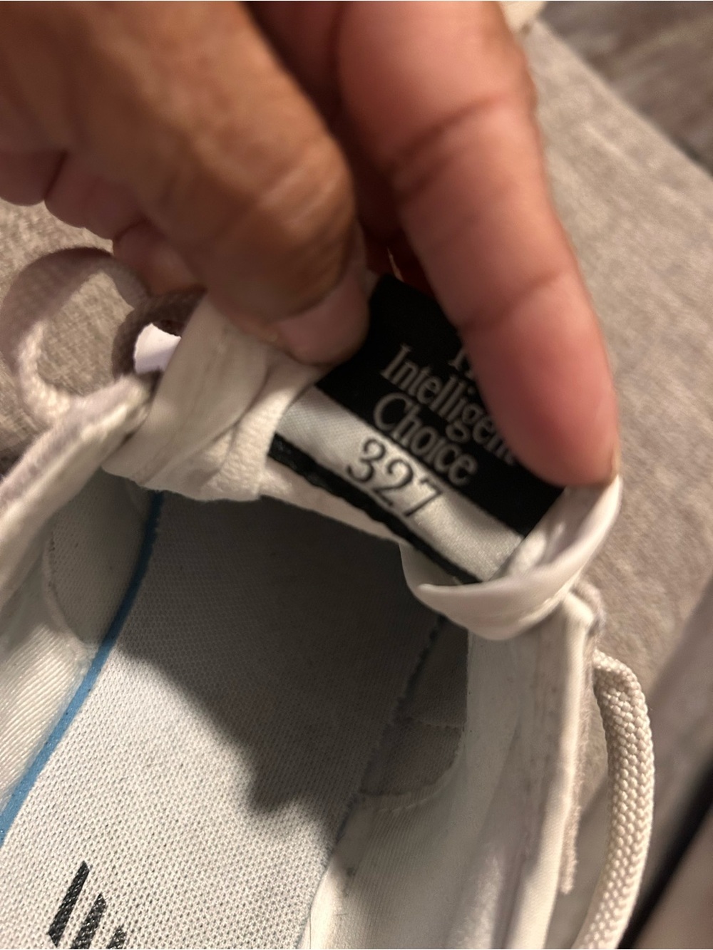 New Balance White and Black Low-Top Sneakers - Picture 9 of 9